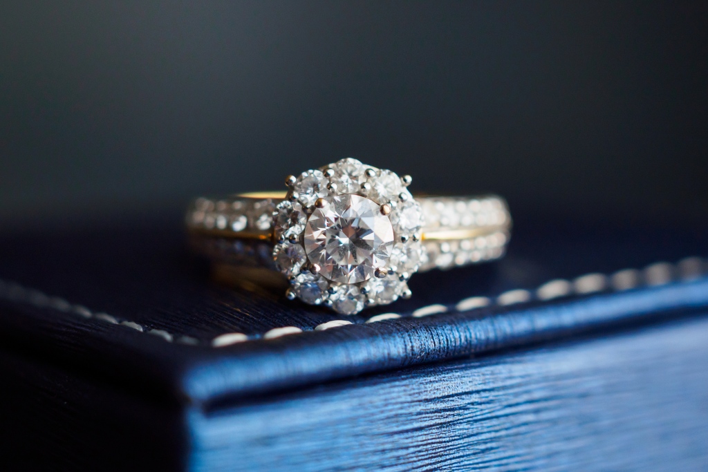 A fancy ring sitting on a box